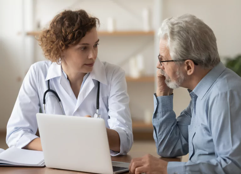 a man speaking with a doctor