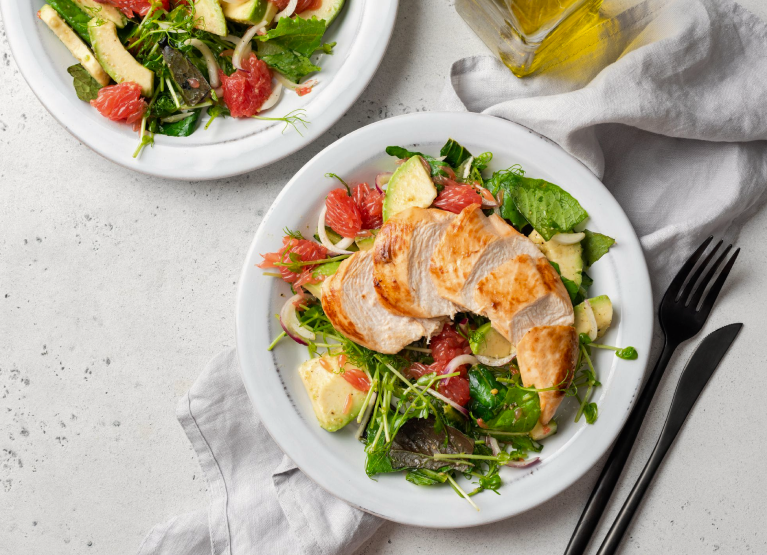 Plate of chicken with veggies
