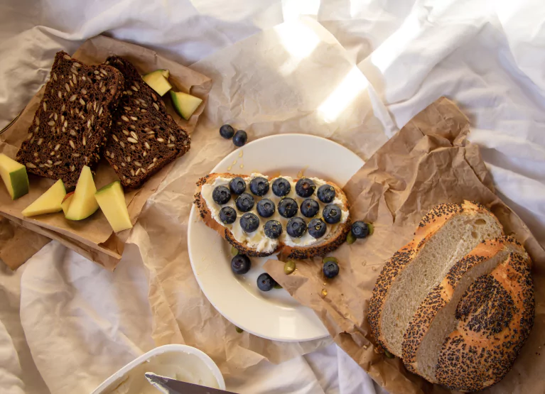 slices of breast and toast with fruit