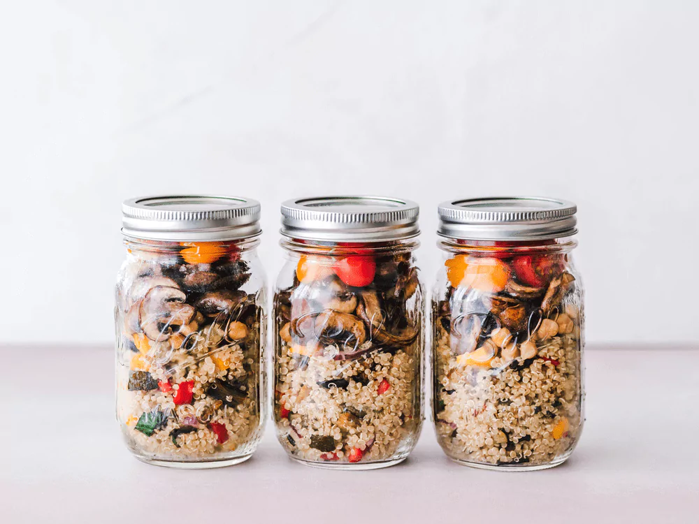 three jars of grains, veggies and mushrooms