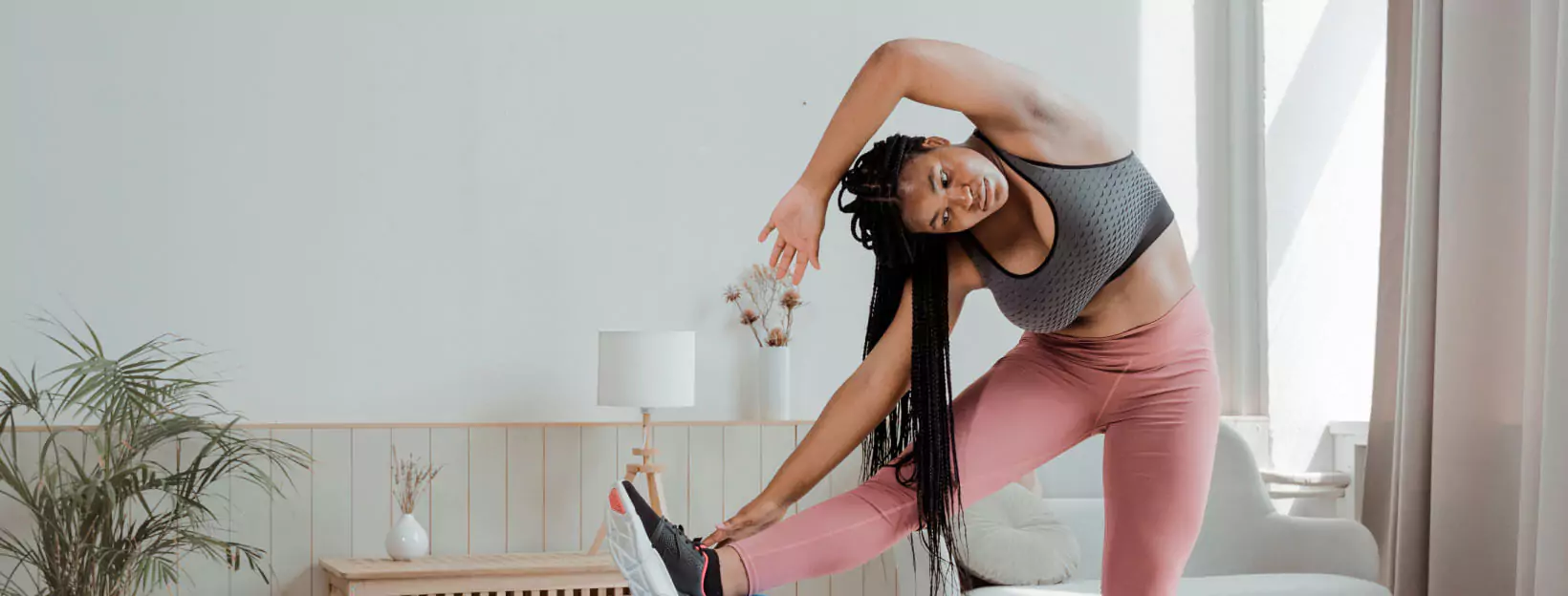 a person stretching at home