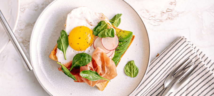 a breakfast plate with eggs