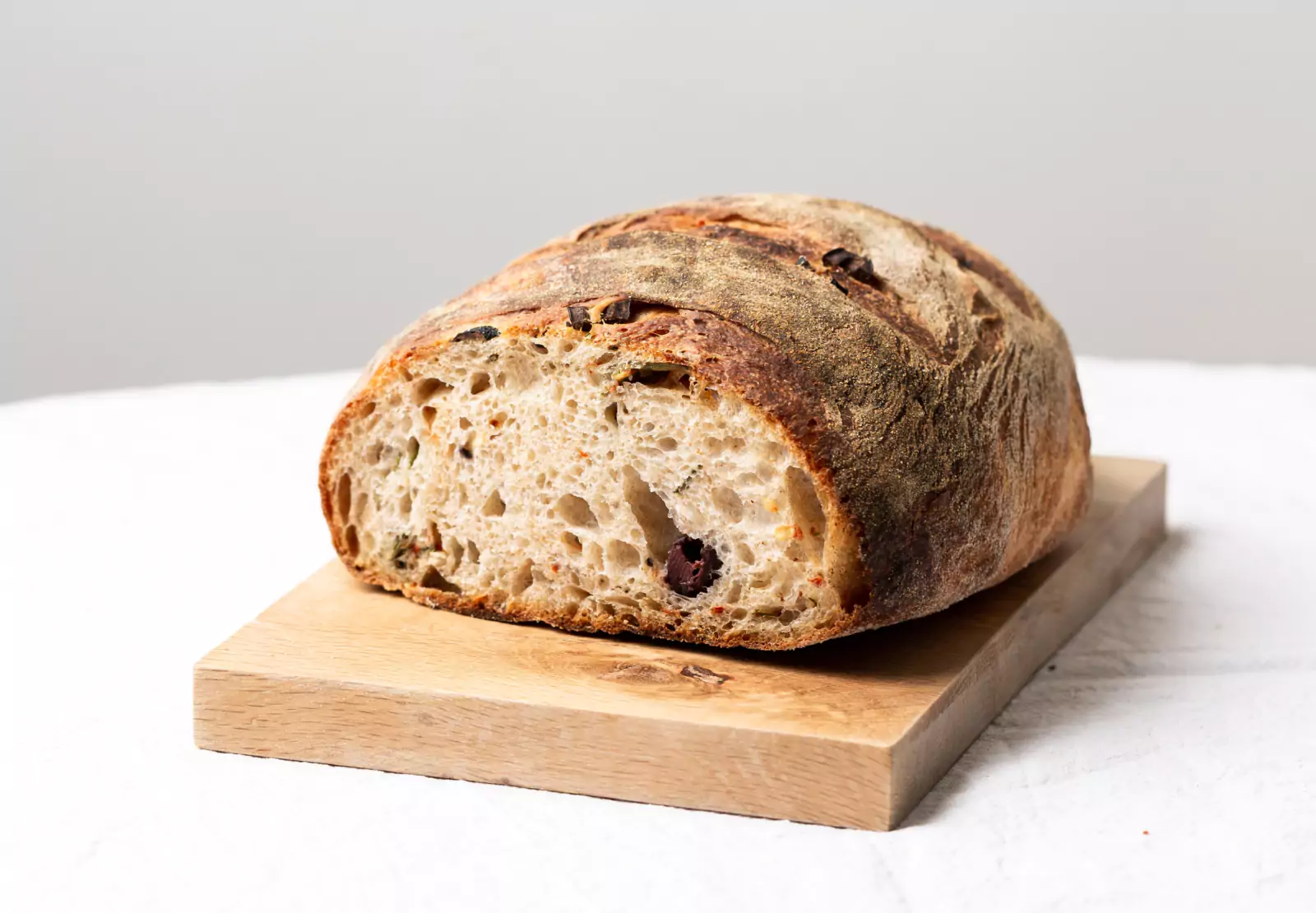 a loaf of bread on a cutting board