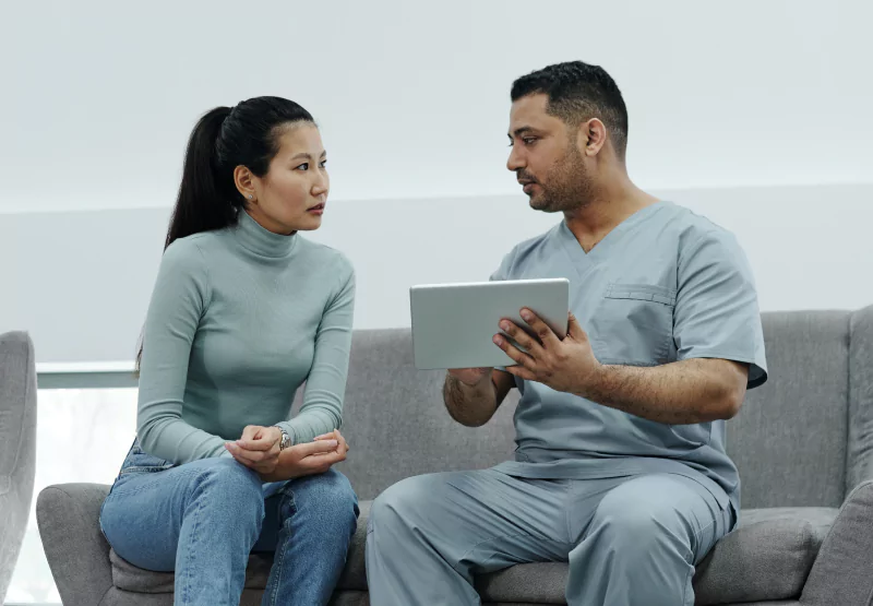 a woman talking to her doctor