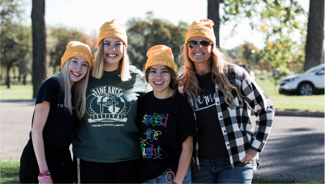 Group of youth and young adults smiling