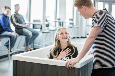 girl smiling about to get baptized