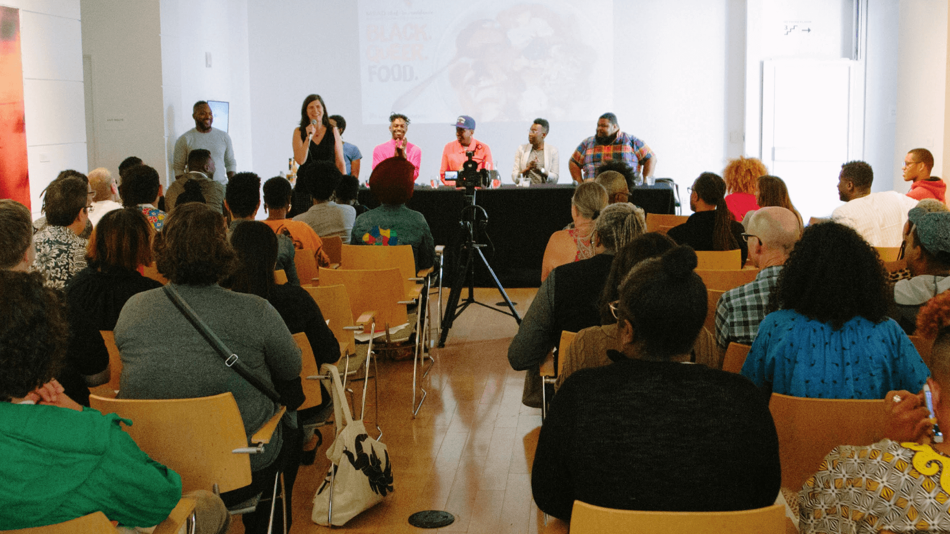 A MoAD event with a large group of people listening to a panel