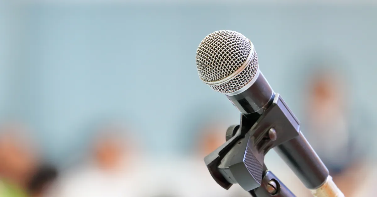 Microphone centered on stage with no one around.