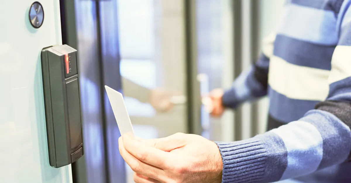 Person scanning ID card to unlock door to his/her office.