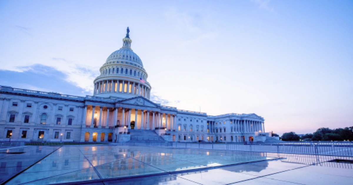 East side of the US Capitol Building at dusk.