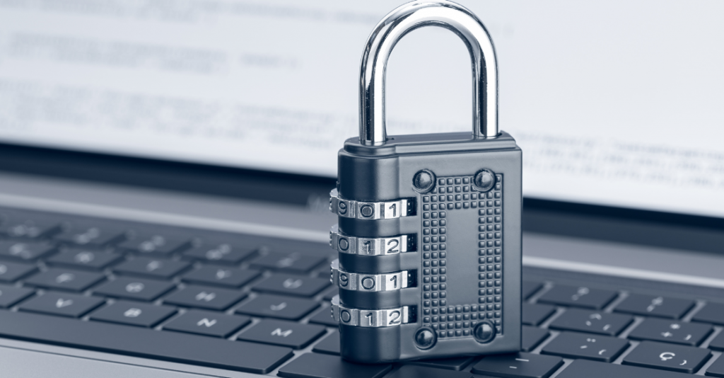 Image of a lock on a keyboard to show the concept of cybersecurity