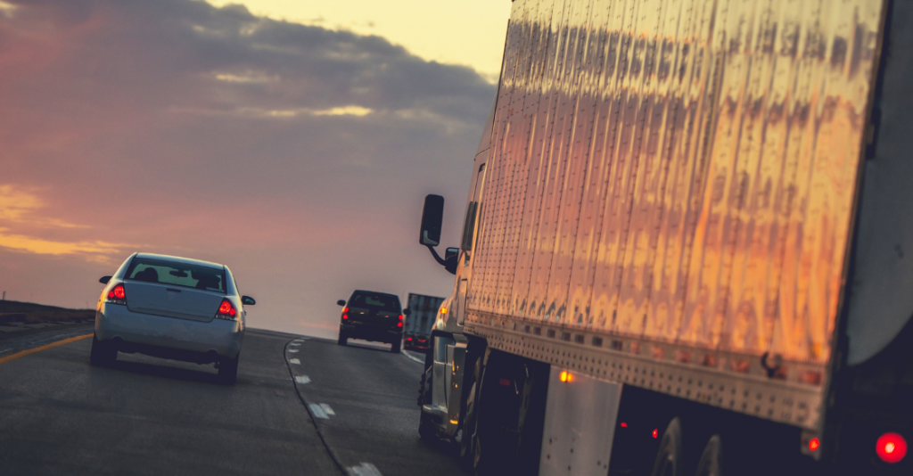 Truck moving a load on the freeway