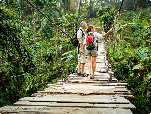 Hiking across a wooden bridge