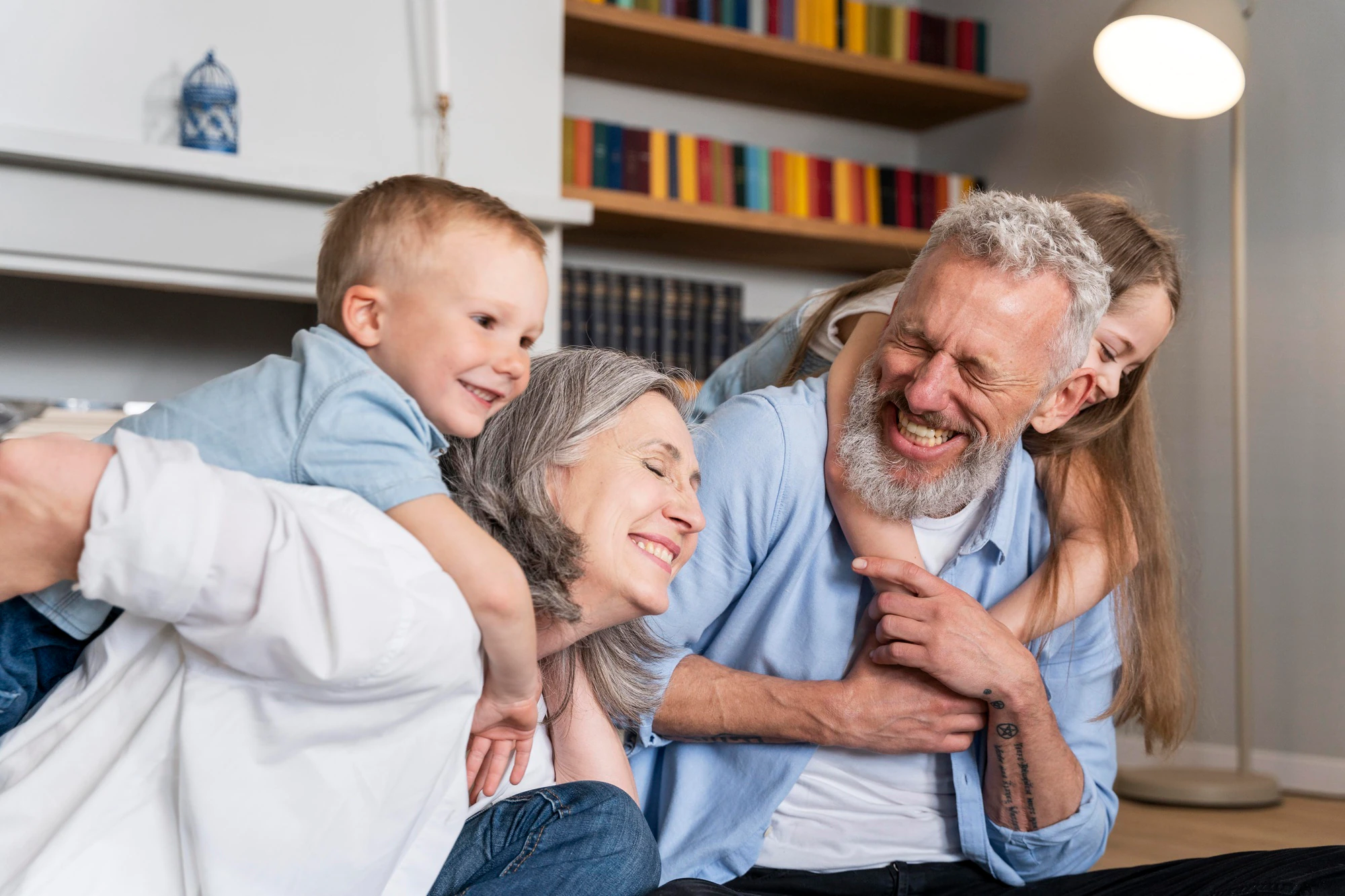 Grandparents playing with their grandchildren