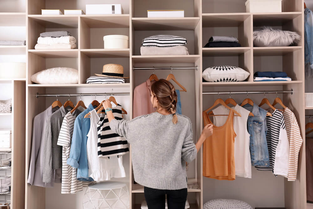 Woman in front of a closet