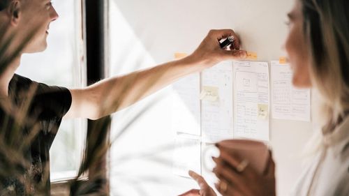Two designers creating a prototype.