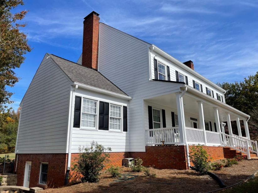 Full Vinyl Siding Replaced With Nichiha Siding and Exterior Painted