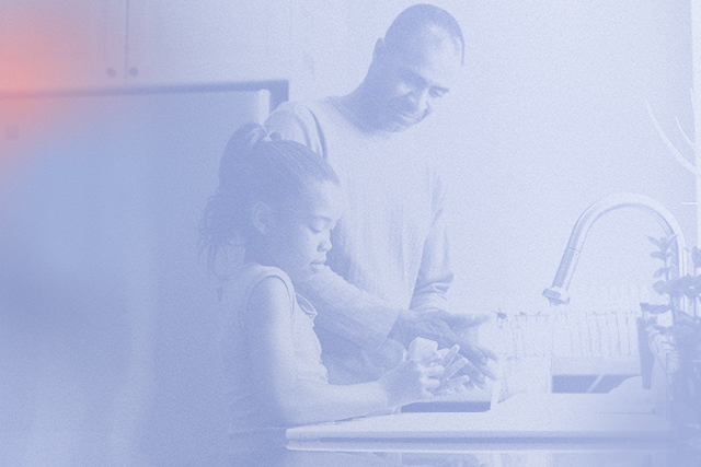 Father and daughter in the kitchen