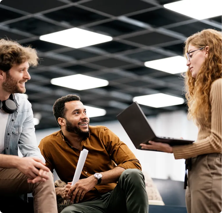 Two mens and a woman working together
