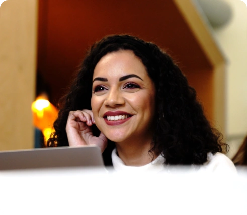 Happy woman speaking with someone