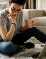 Person sitting with coffee