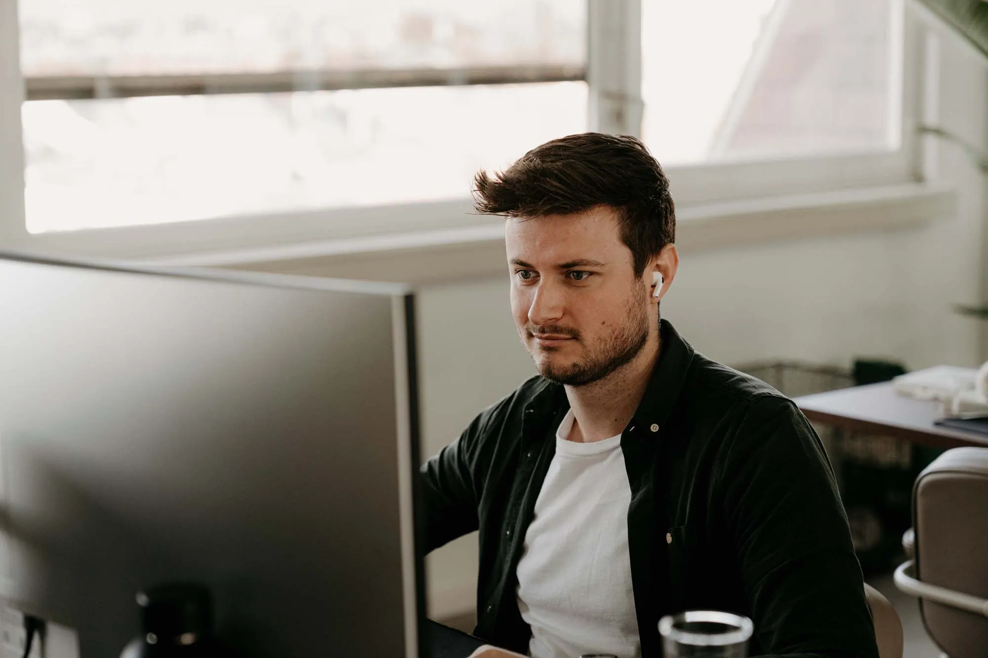 Louis at the office working on a project