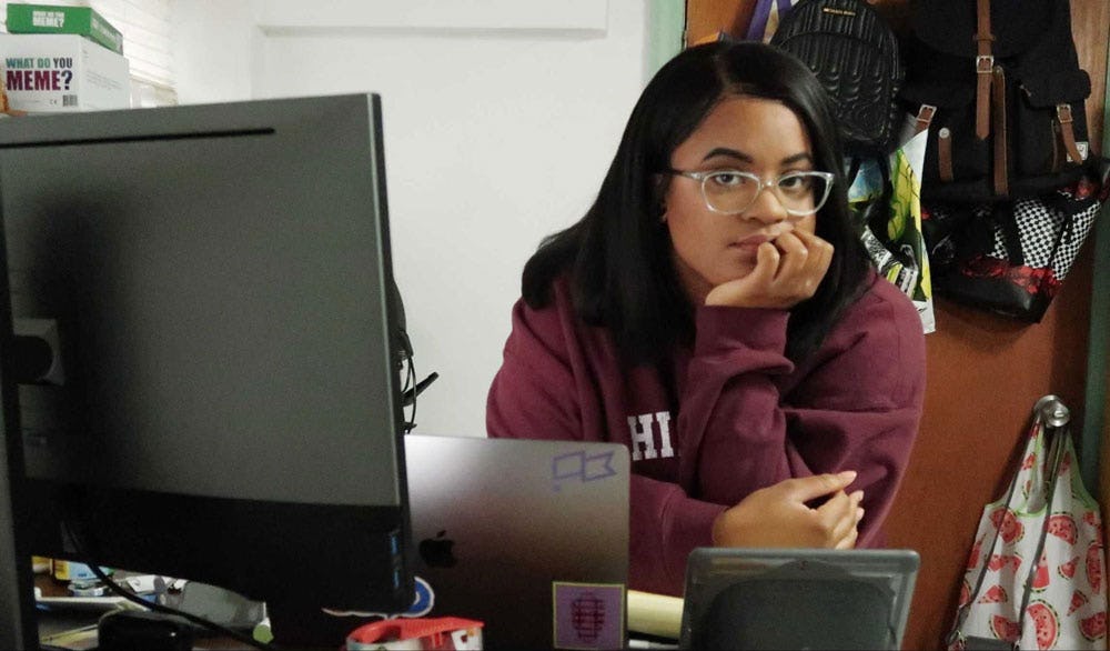 Christina at desk