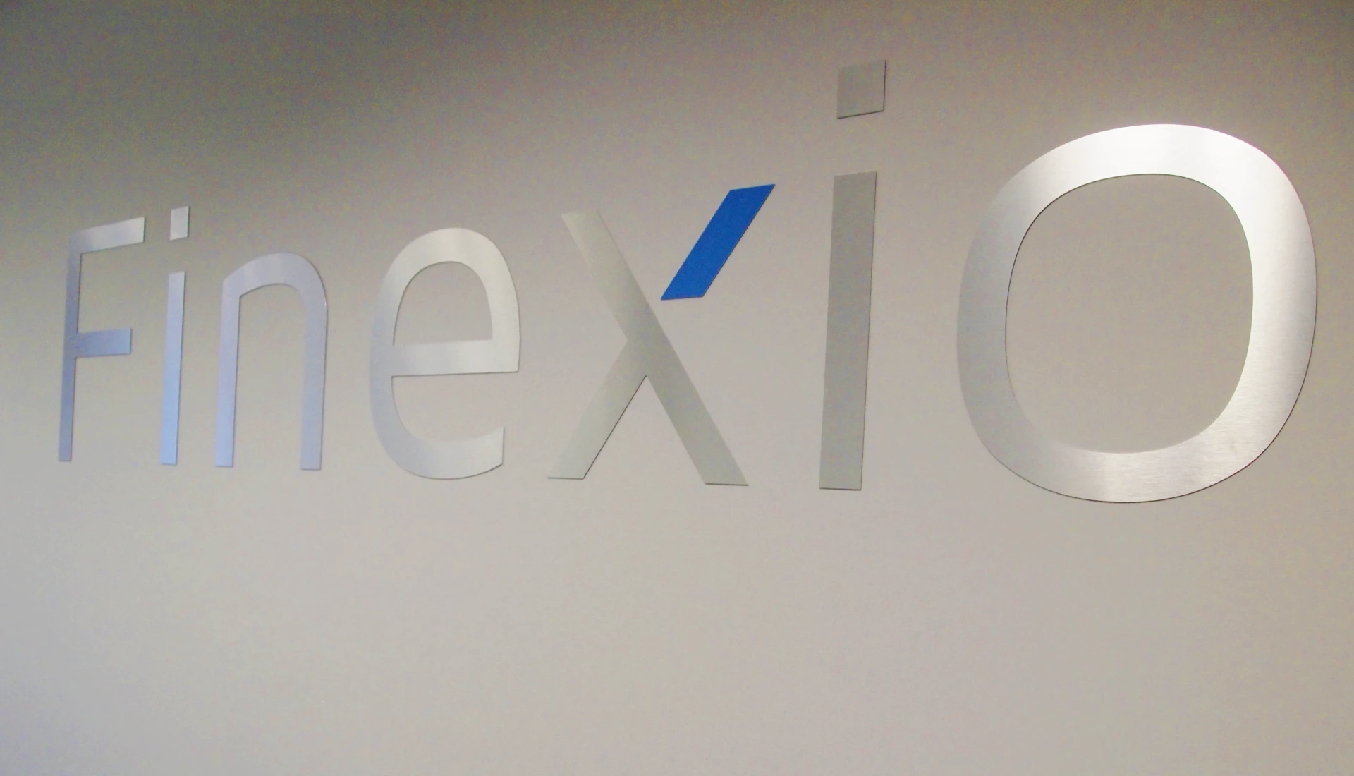 Finexio logo on a wall