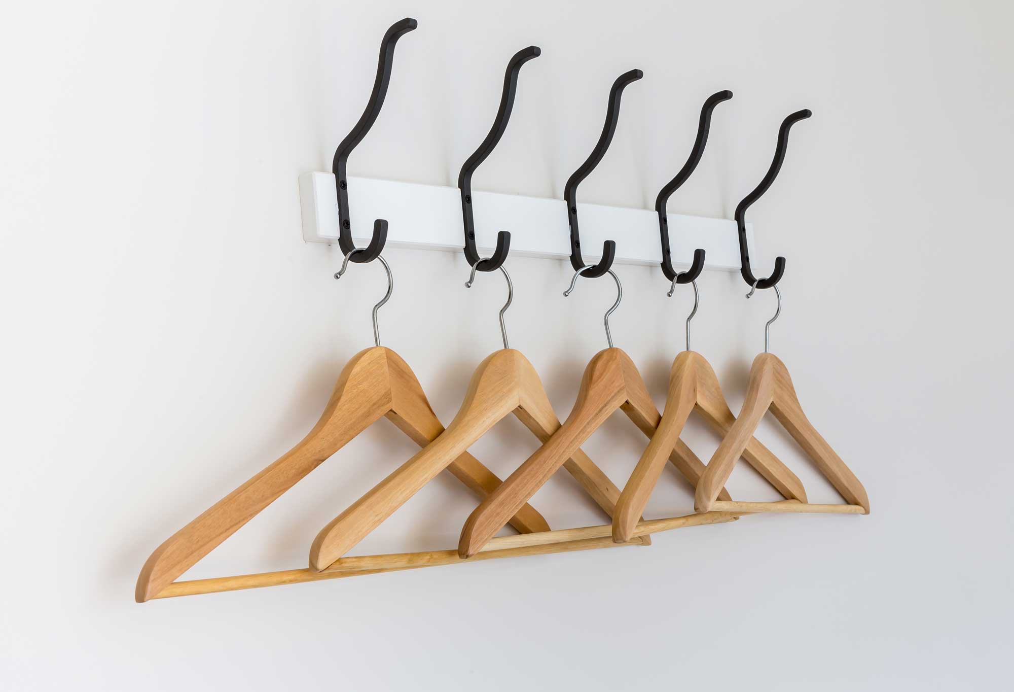 The Benefits of Wooden Hangers for Your Clothing