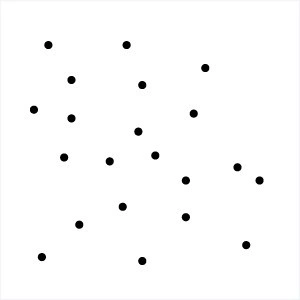 A random scattering of 22 black dots on a white background.