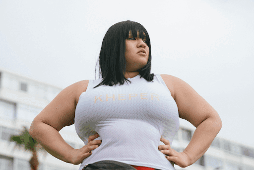 A plus-size woman with black hair