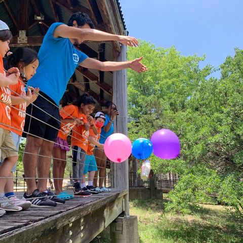 Kids playing with balloons