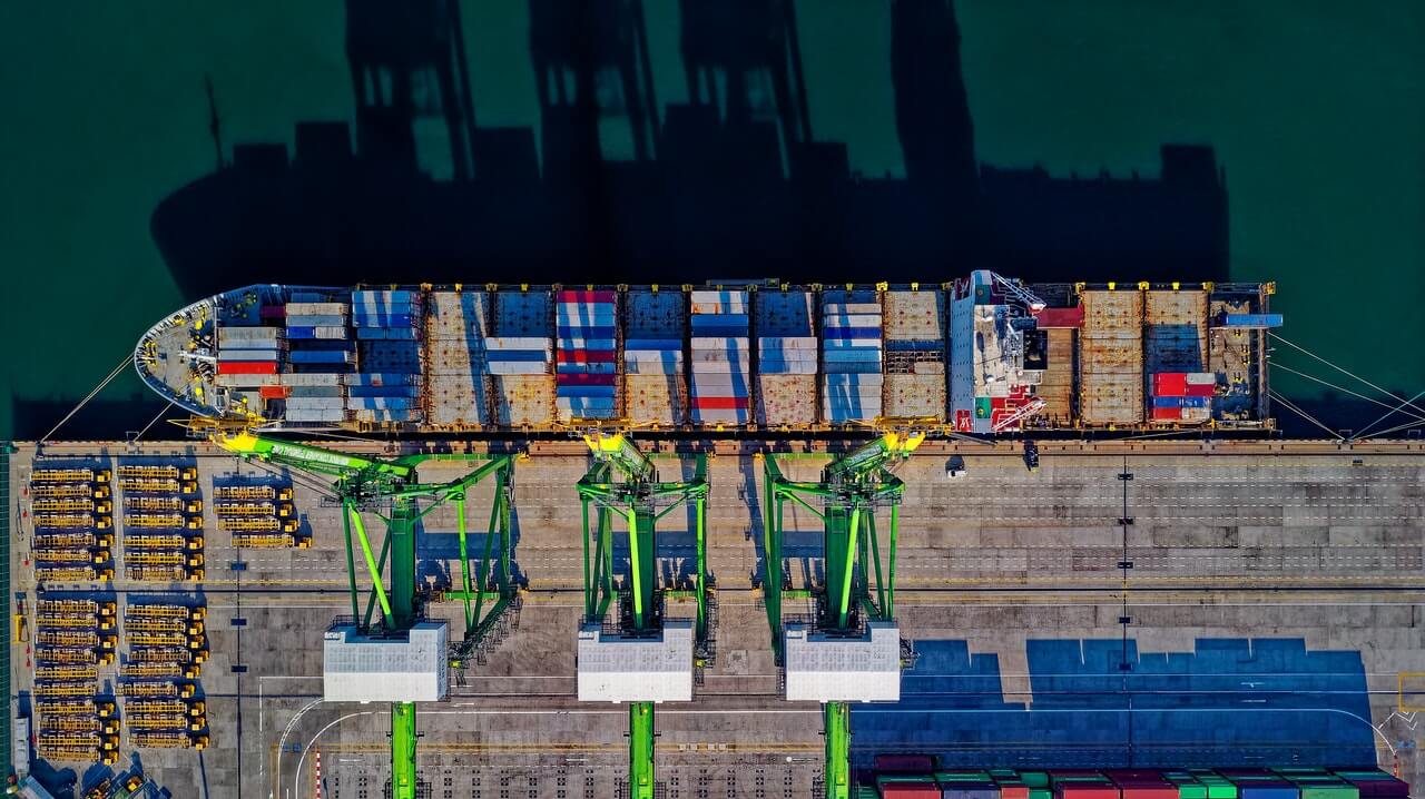 ship next to a dock in a port