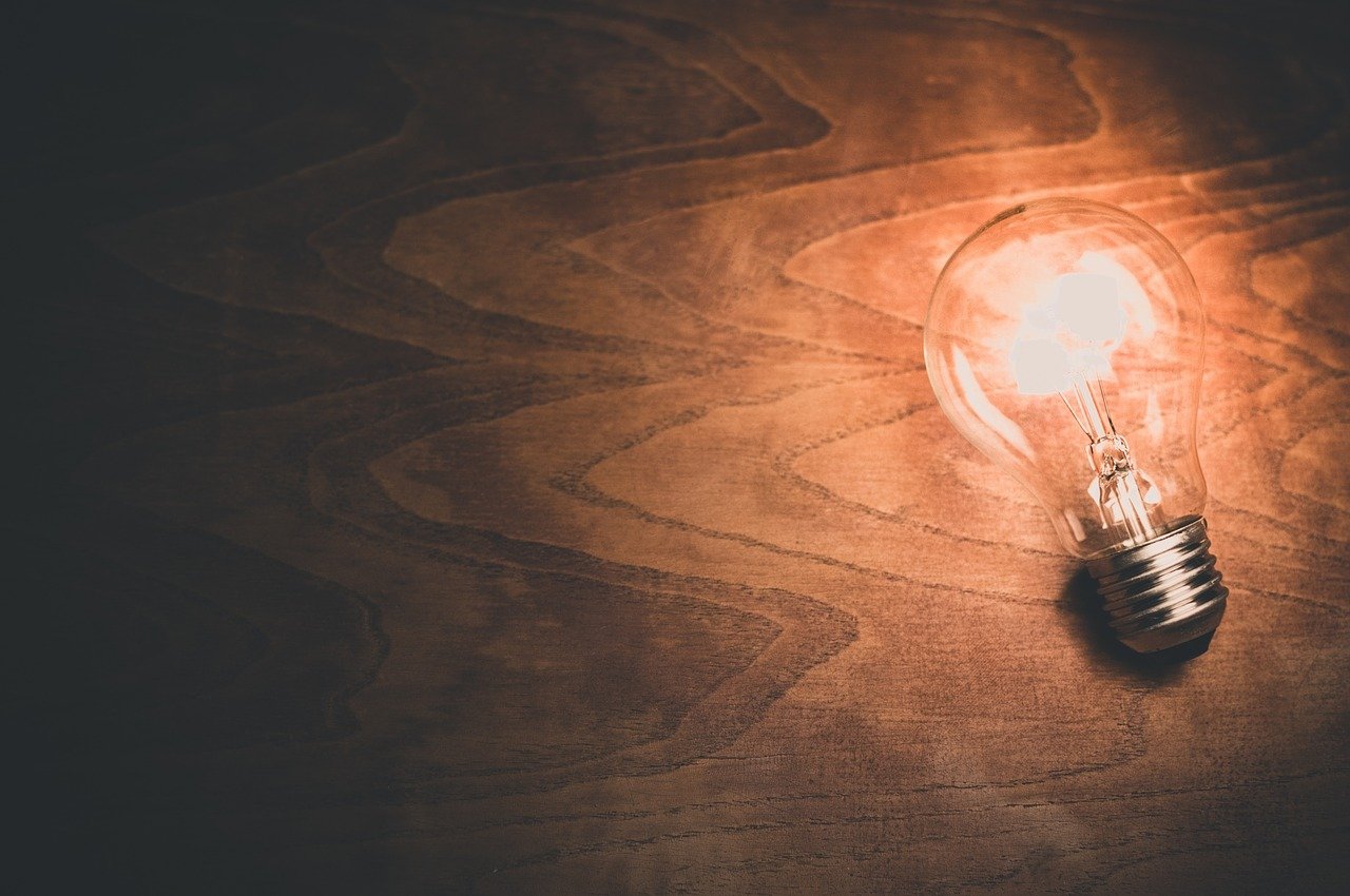 bulb over wooden background