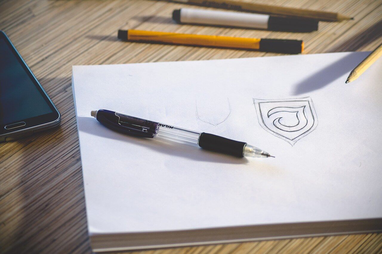 pencil sketch of a logo