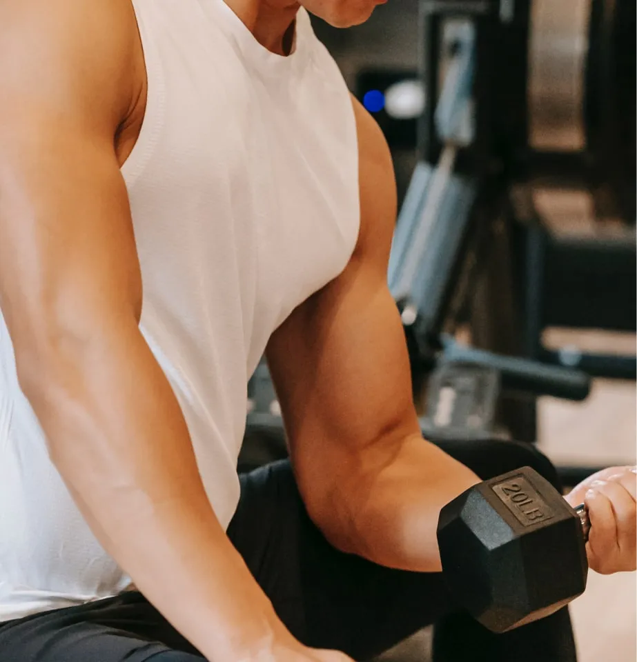 Man curling bicep weights