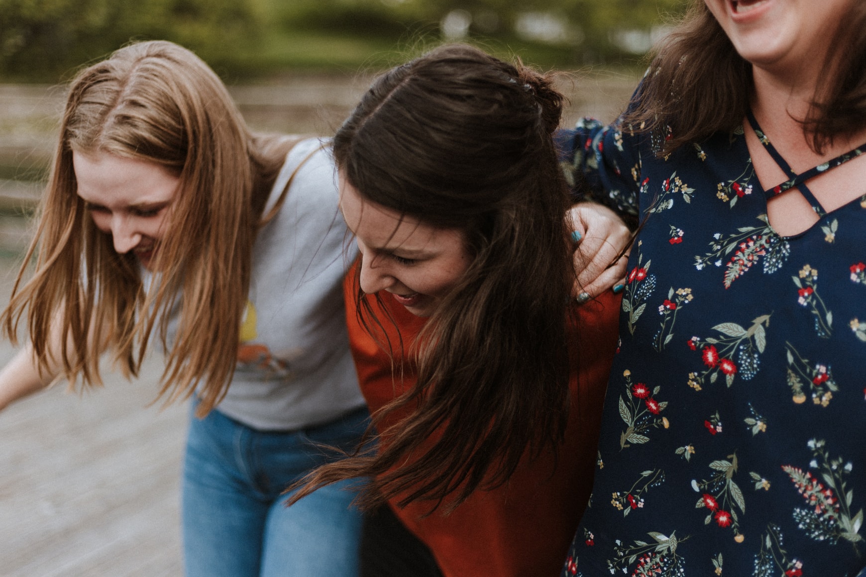 girls laughing and hugging