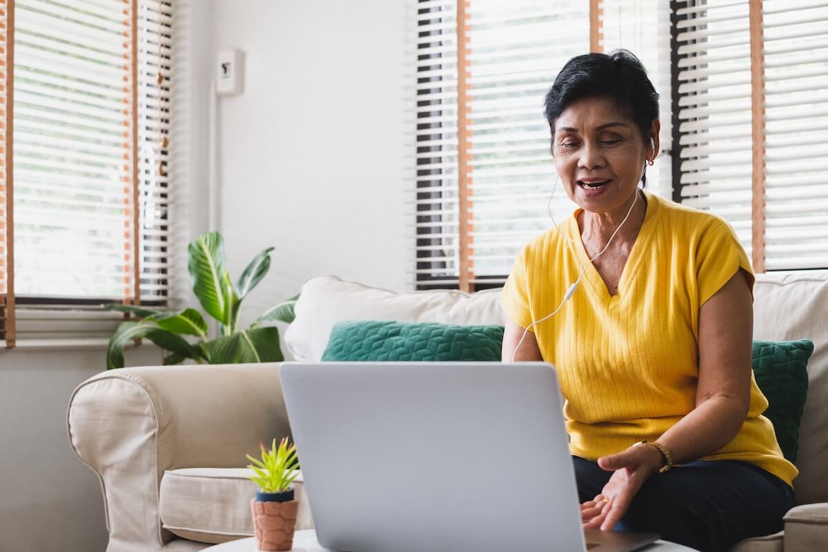 How to prepare for an MRI: senior woman using a laptop for a video call