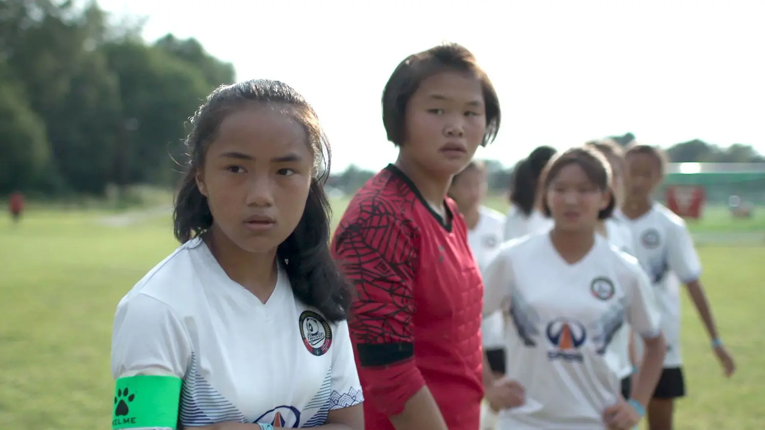 Yu from China and her teammates in The Enduring Captain; part of the storyworld series Kids' Cup.