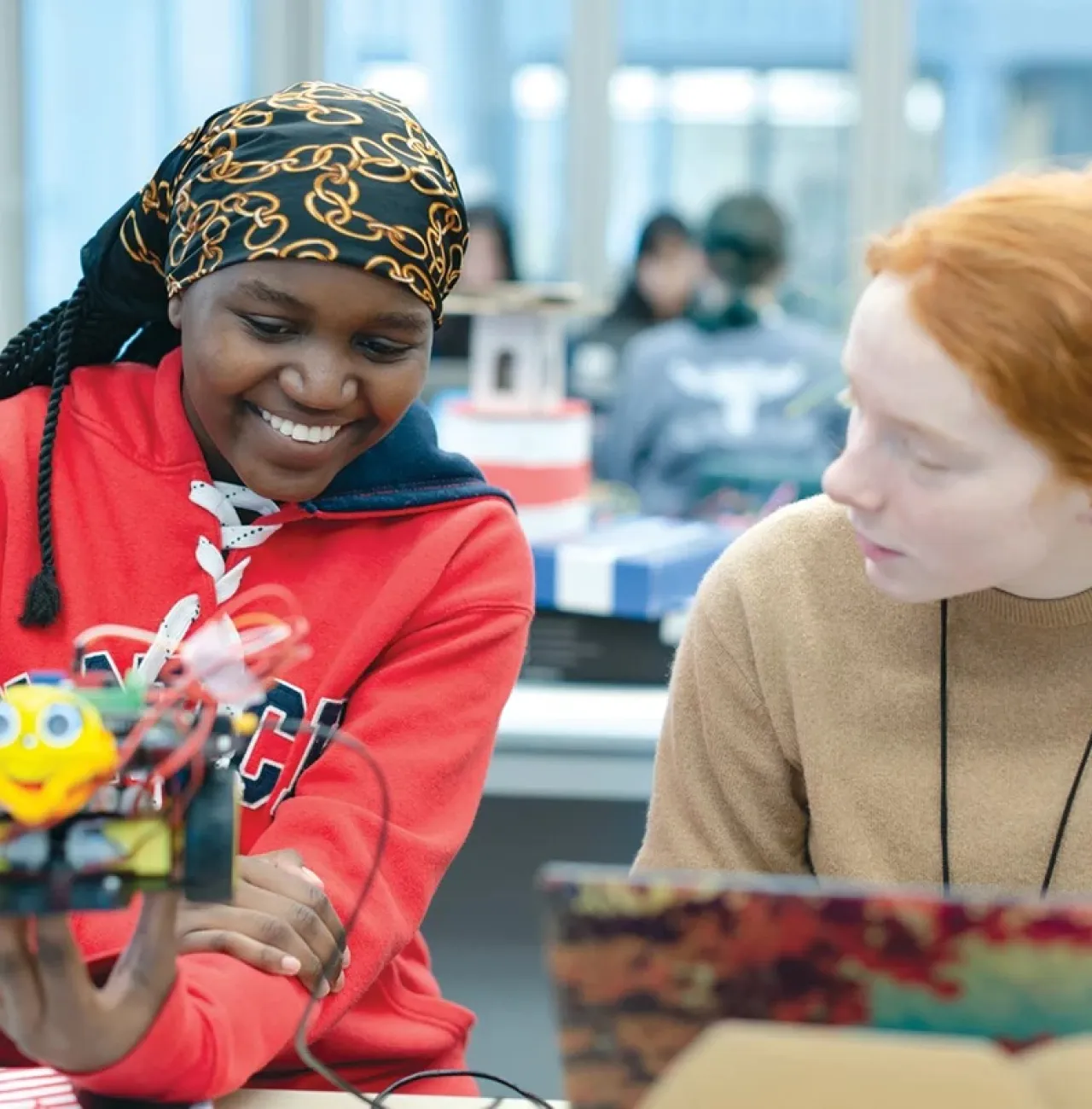 Two Miss Hall's School students working on a robotics project.