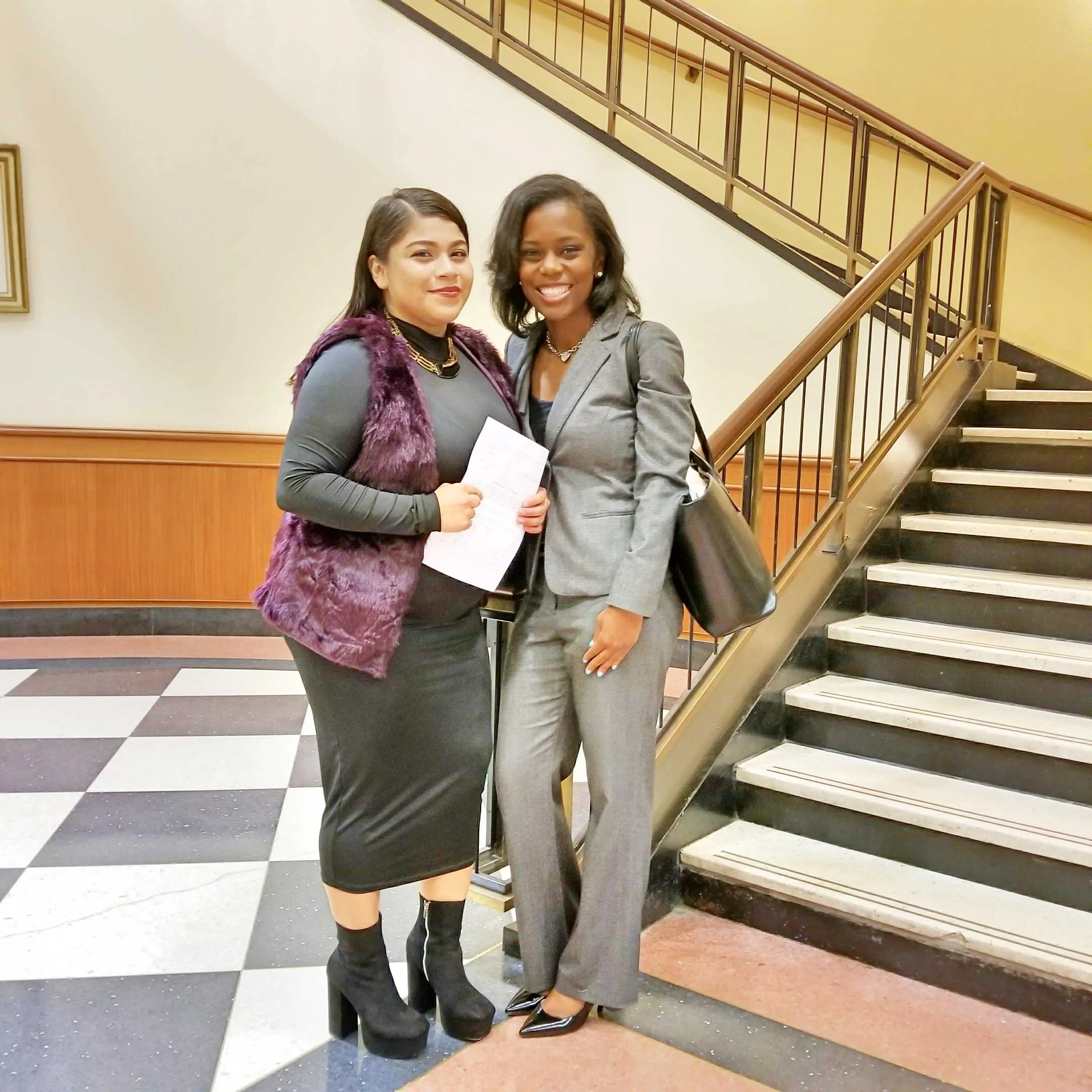 Angel Murphy and a client after winning a case