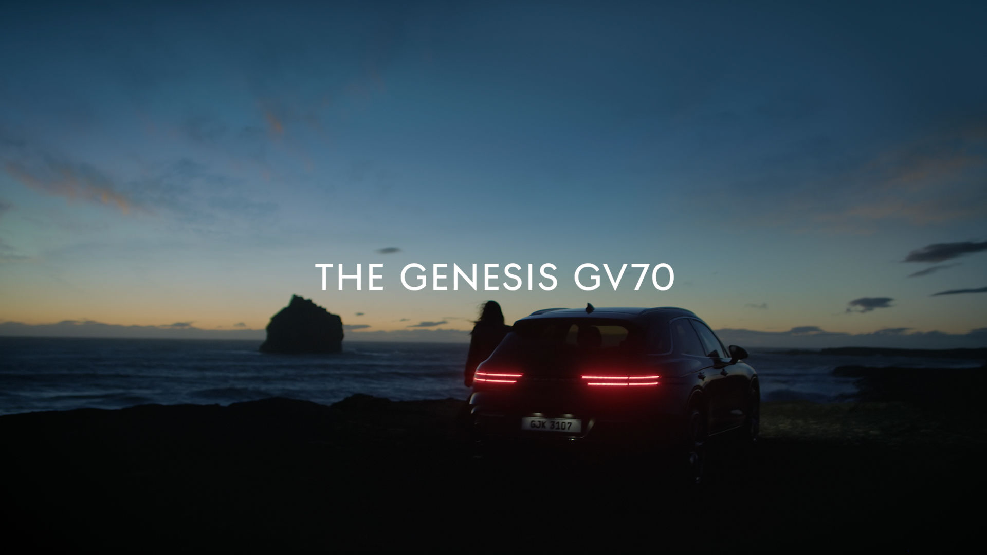 Genesis GV70 parked on a beach