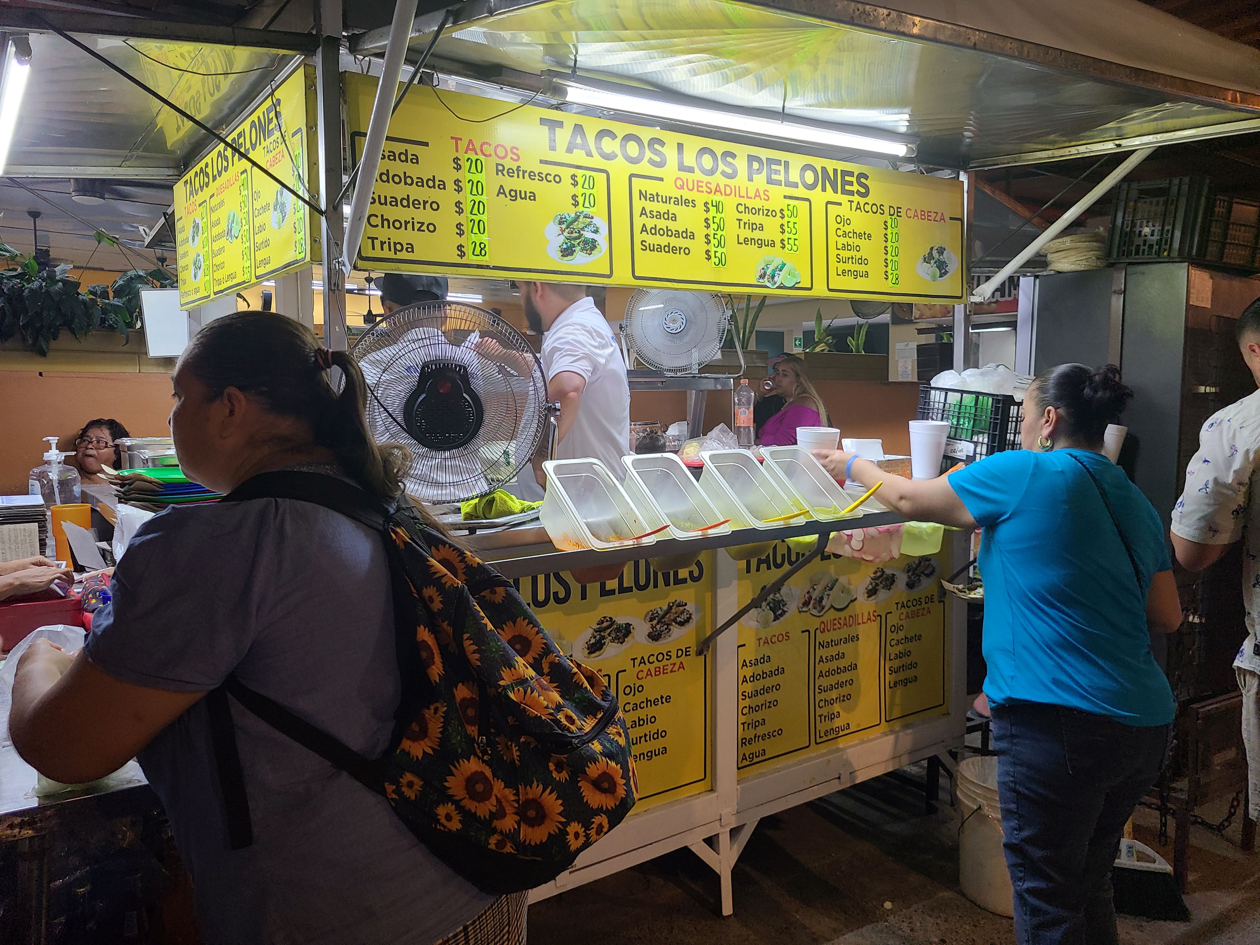 Street taco stand in Puerto Vallarta with affordable local food
