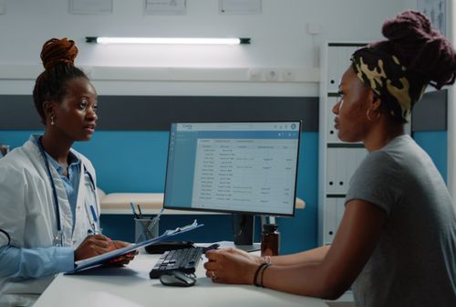 Doctor talking to patient