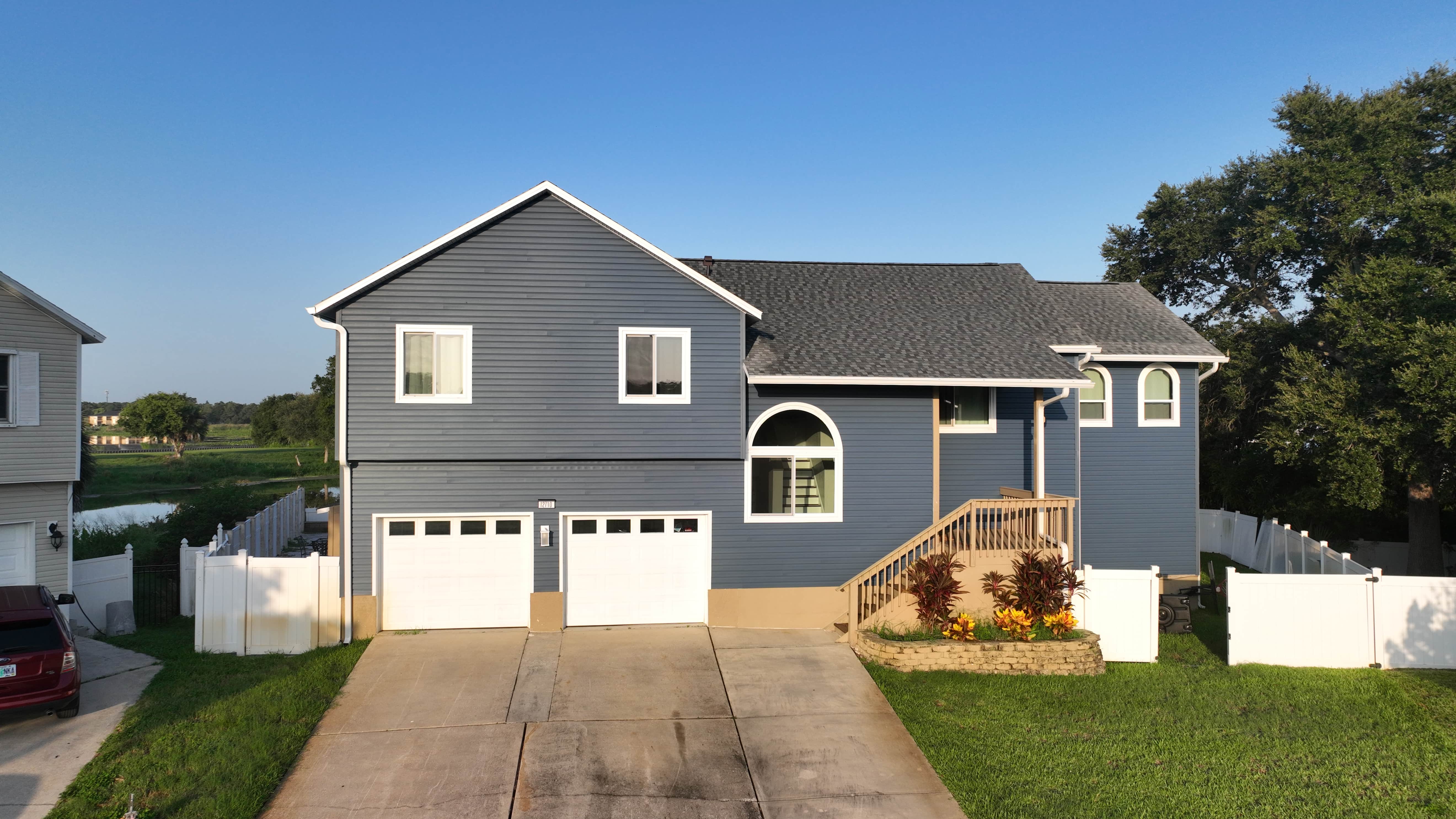 Coastal House Mastic Siding Transformation In Bayou Blue