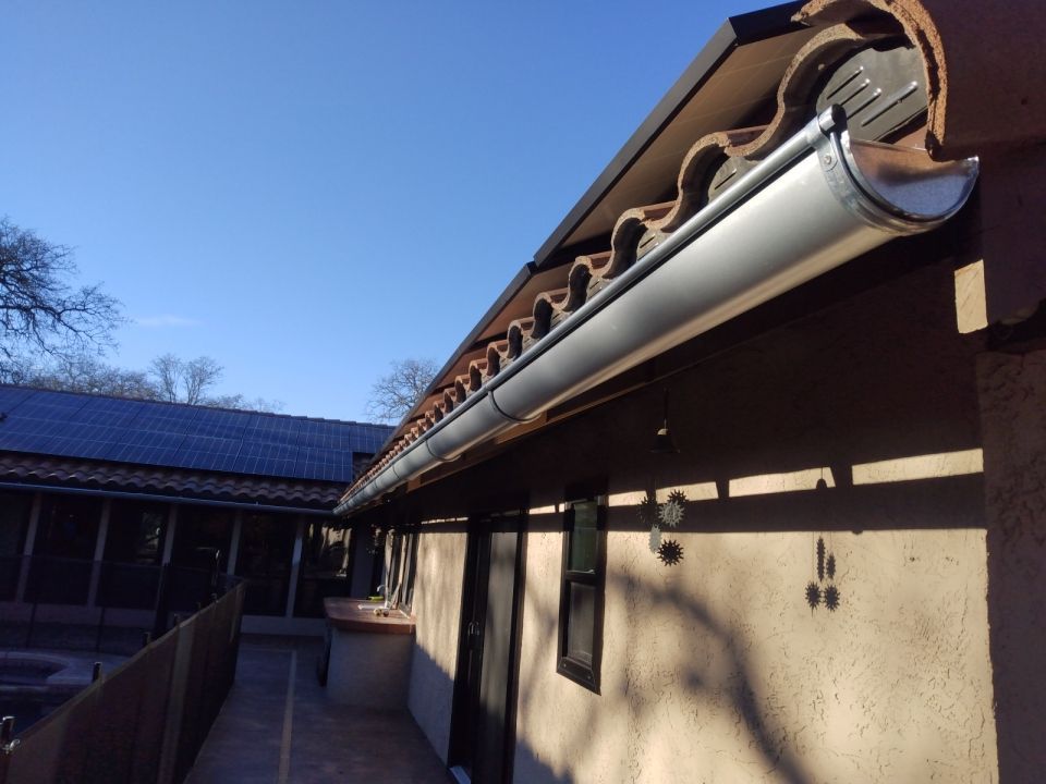 Spanish Tile and Half Round Gutters American Eagle Roofing