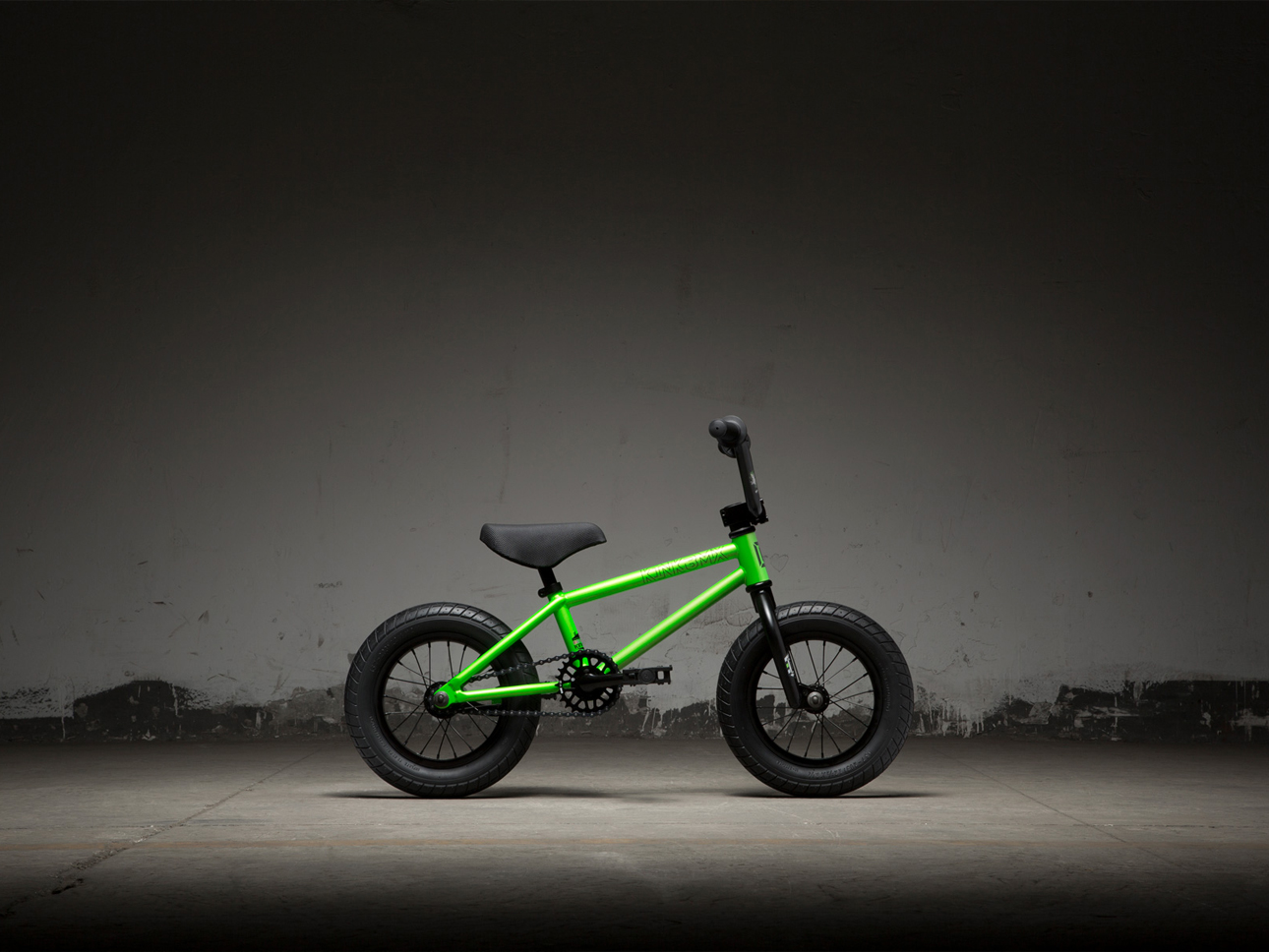 Green kids BMX bike. 