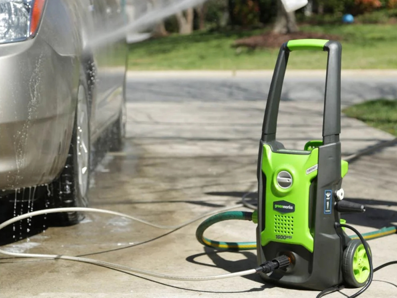 Greenworks pressure washer cleaning vehicle. 