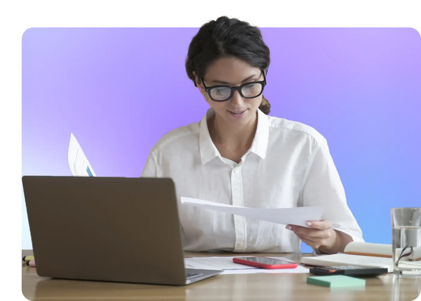 Image of a woman working at a desk