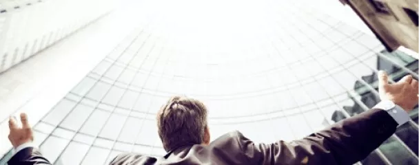 a group of people looking at a solar panel